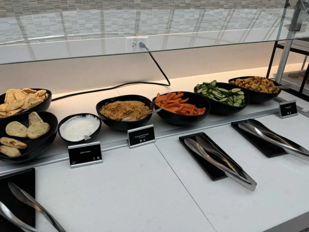 Hummus, veggies, and pita bread at Admirals Club DFW Terminal A