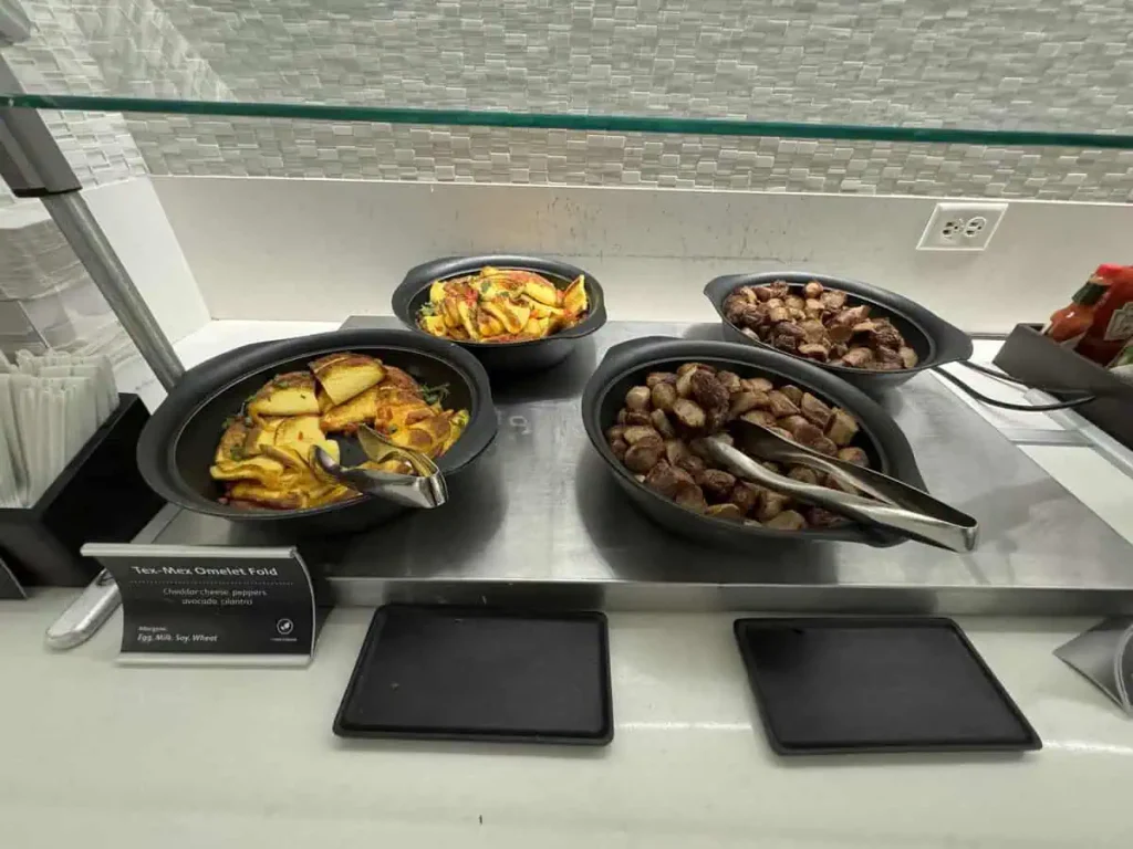 Hot breakfast foods at Admirals Club DFW Terminal A